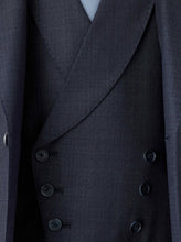 Load image into Gallery viewer, A double-breasted blue waistcoat crafted from Super 130s Italian wool, featuring a 3x3 button design with grey horn buttons, welt pockets, and a straight bottom. The navy lining matches the jacket, while the back lining includes a belt and buckle for an adjustable fit.