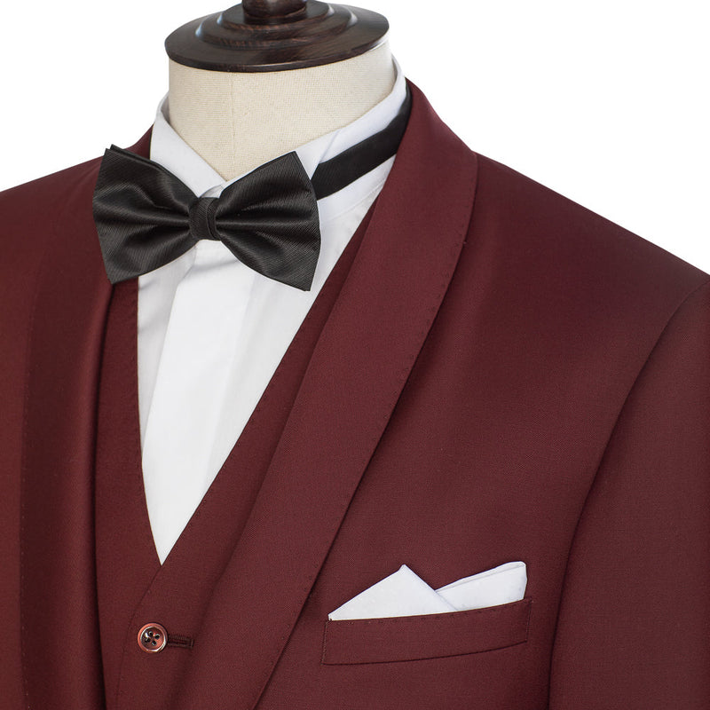 Maroon suit with black bow tie on a mannequin against a white background