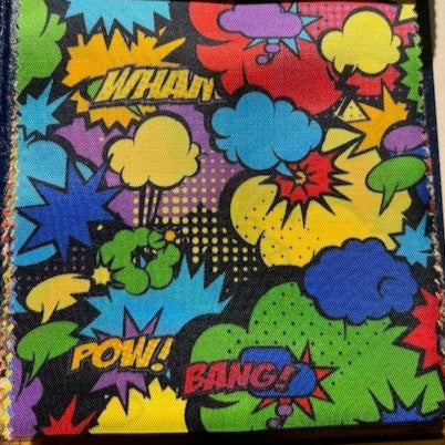 Colorful lining with comic book-style designs and text, including 'WHAM!', 'POW!', and 'BANG!'.