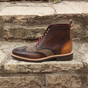 Brown leather boot with patterned accents 