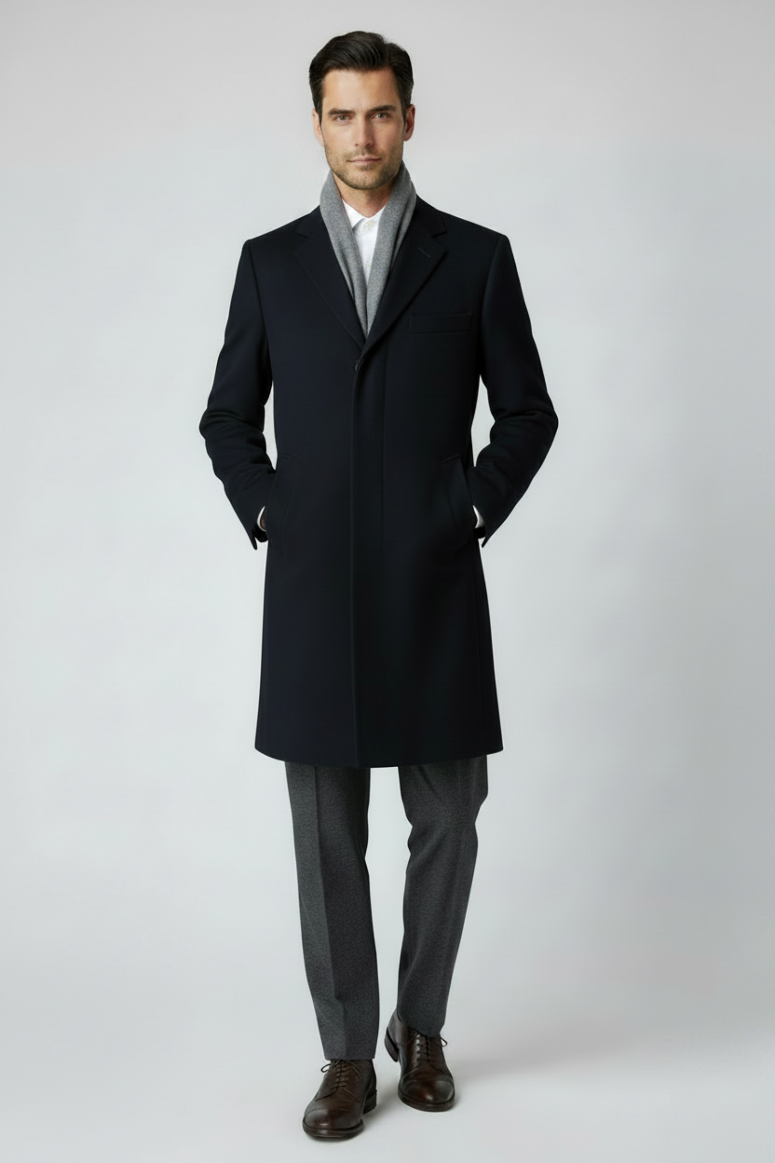 Man in Navy Overcoat with Short Grey Scarf