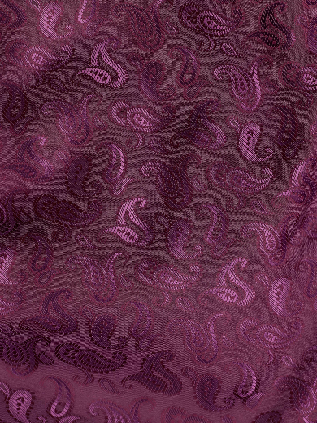 Elegant burgundy paisley lining inside the green velvet dinner jacket, adding a refined and sophisticated touch to the formal design.