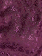 Elegant burgundy paisley lining inside the green velvet dinner jacket, adding a refined and sophisticated touch to the formal design.